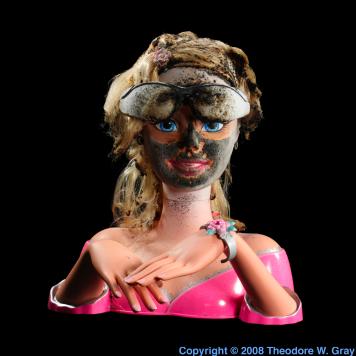 Hydrogen Burned Barbie doll with glasses